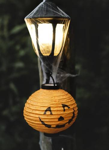 Light post with spiderweb on Halloween